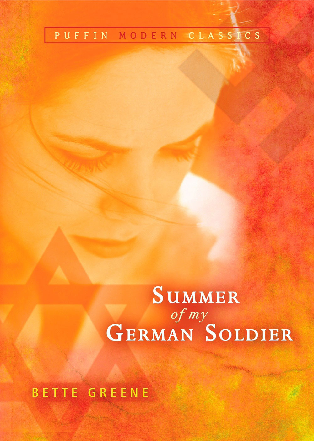 Close up duotone of young woman with Jewish star in foreground