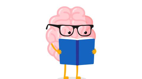 A brain with glasses on reading a blue book