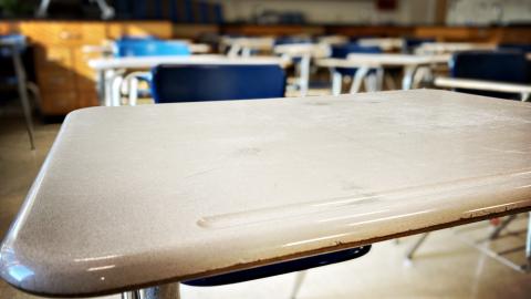 Empty desk in a science classroom