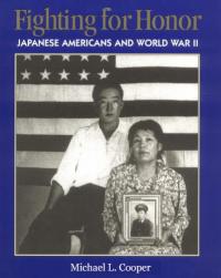 Japanese American husband and wife holding portrait of family member and WWII American soldier