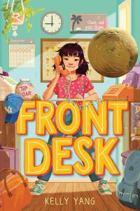 Young girl answering phone at motel front desk