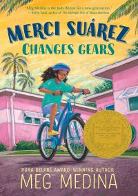 Young woman rides bicycles past palm trees