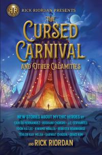A tall carnival tent open at the bottom with a man walking through the entrance