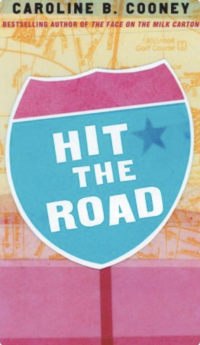 Title on a pink and blue road sign