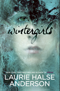Young girl looking through a watery facade