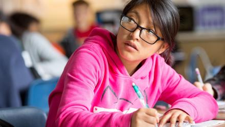 Latina student in high school class