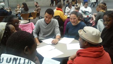 Multicultural high school students in Real World History discussion on Selma