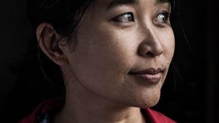 Thi Bui looking off in the distance