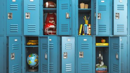 blue lockers opened to reveal items from various academic disciplines