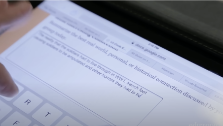 Student is filling out an exit slip on their iPad