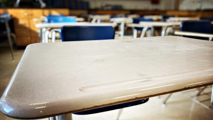 Empty desk in a science classroom