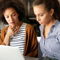 Two teachers talking about professional development course