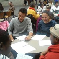 Multicultural high school students in Real World History discussion on Selma