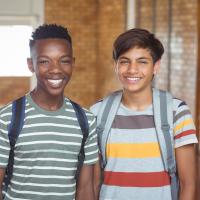 Two smiling adolescent boys