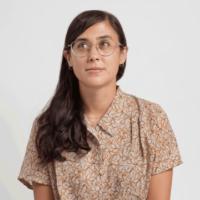 Francesca Silva sitting cross legged on the floor