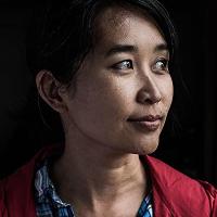 Thi Bui looking off in the distance