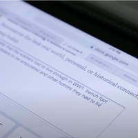 Student is filling out an exit slip on their iPad