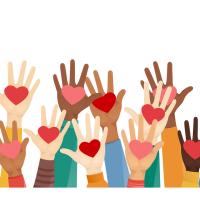 many hands holding hearts into the air