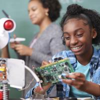 MG girl building a robot