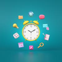 Alarm clock with school related symbols surrounded it